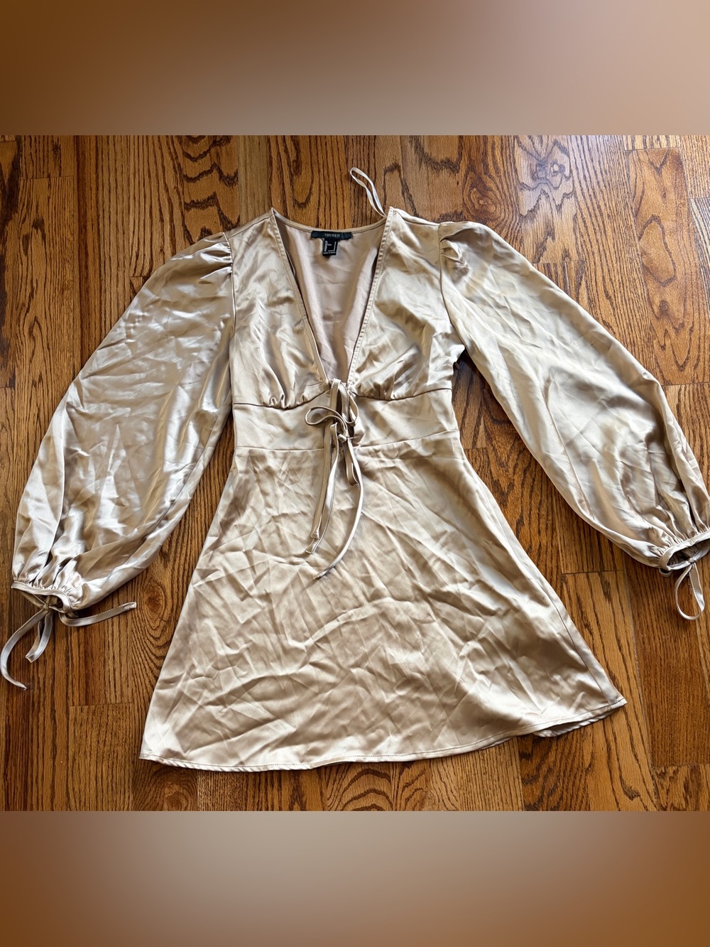 Golden color mini silky dress very sexy and cold soft.